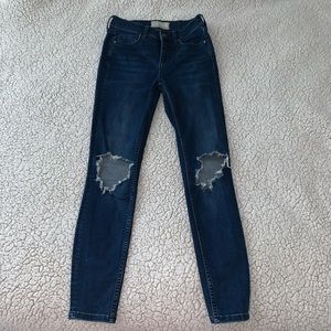 Free people busted knee skinny jeans